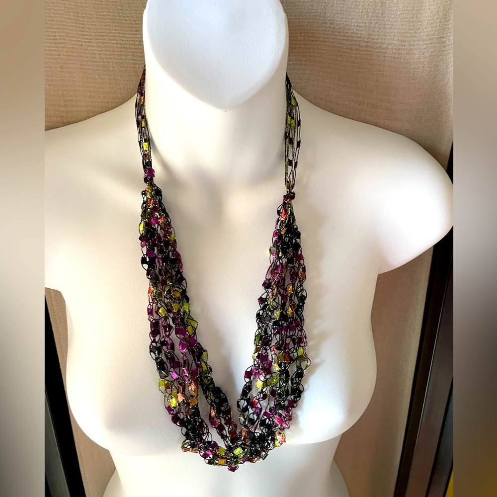 Hand made necklace with Purple & Green yarn shades. 26 inches in length. NWOT